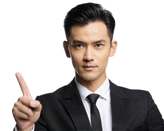 A man with a serious expression and confident demeanor points his finger toward an exercise, indicating focus and determination.
